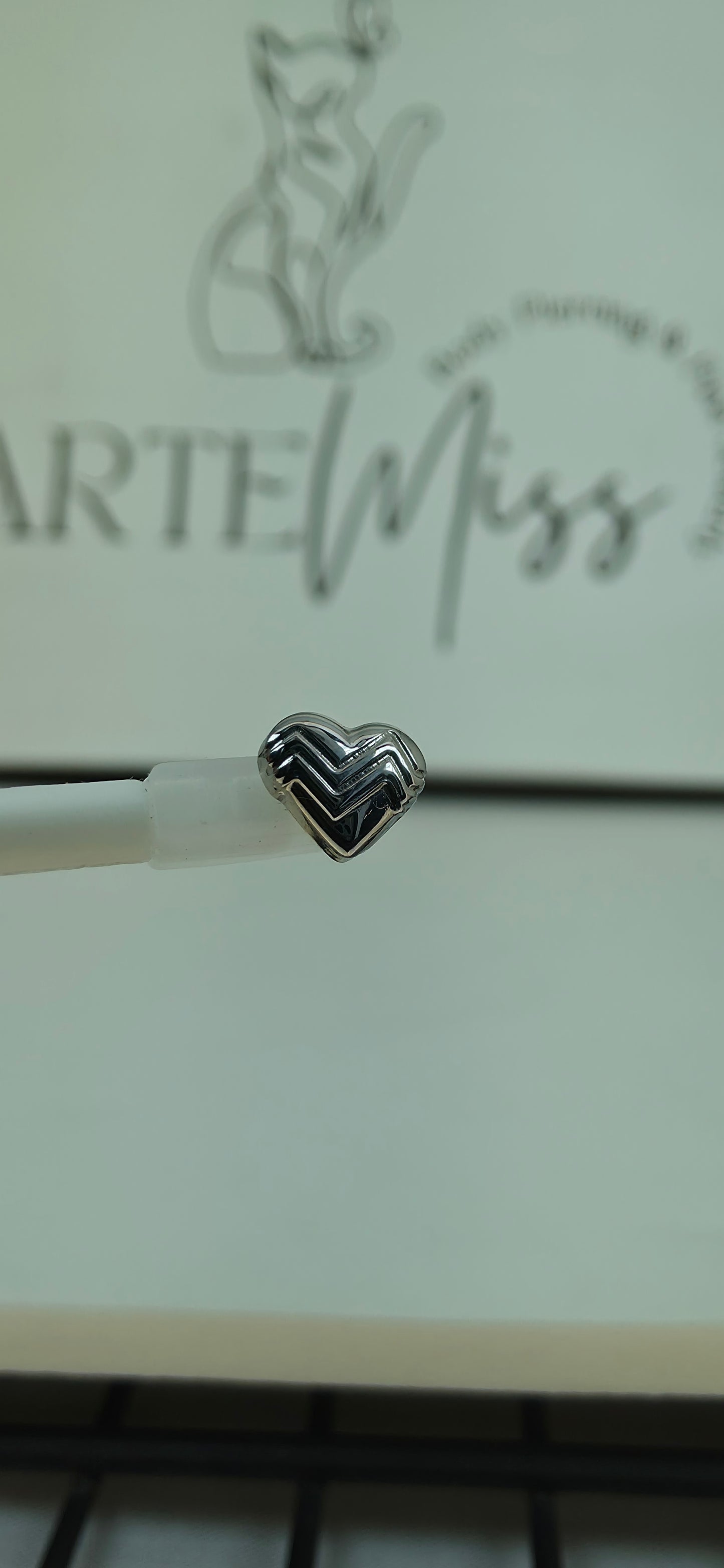 Top de Titanio en forma de corazon