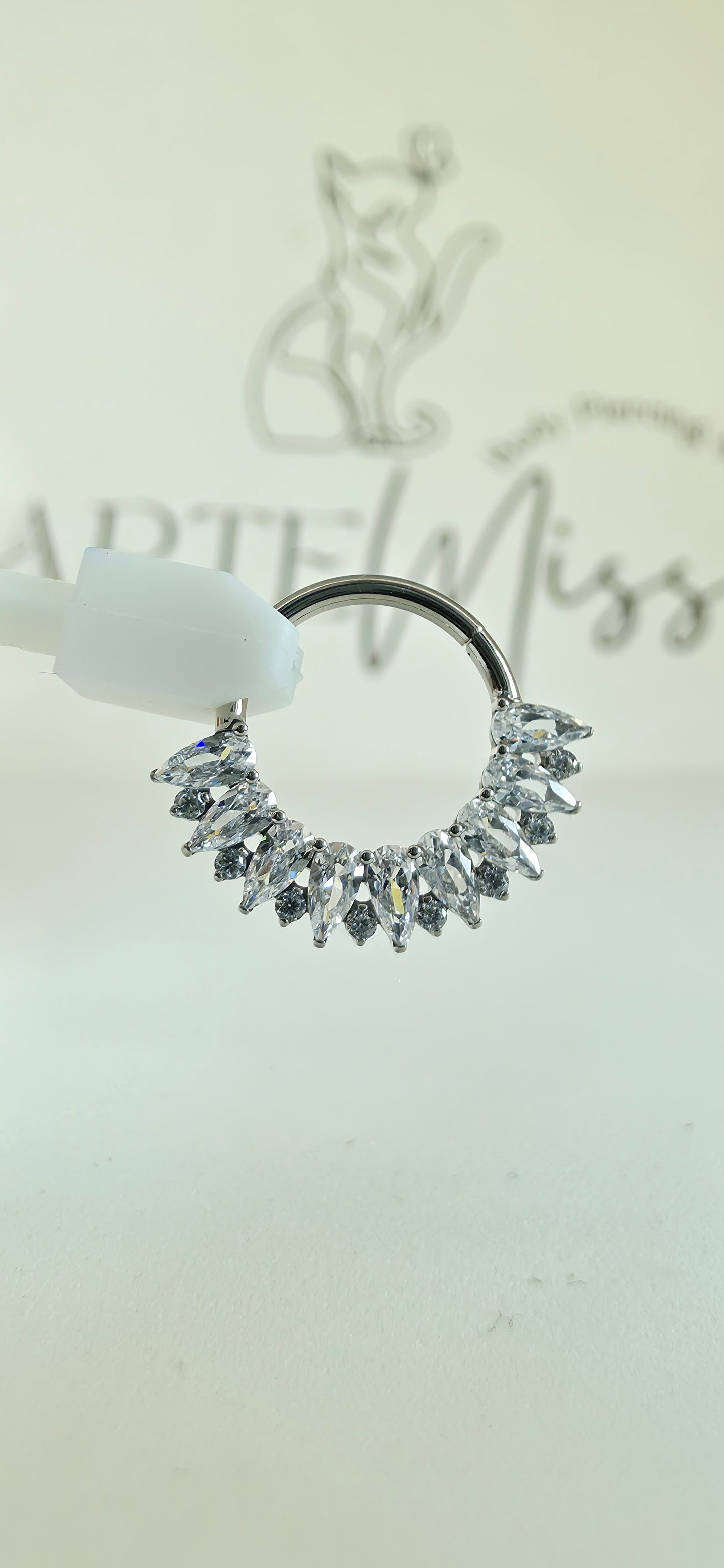 Clicker de Titanio con incrustaciones de zirconia