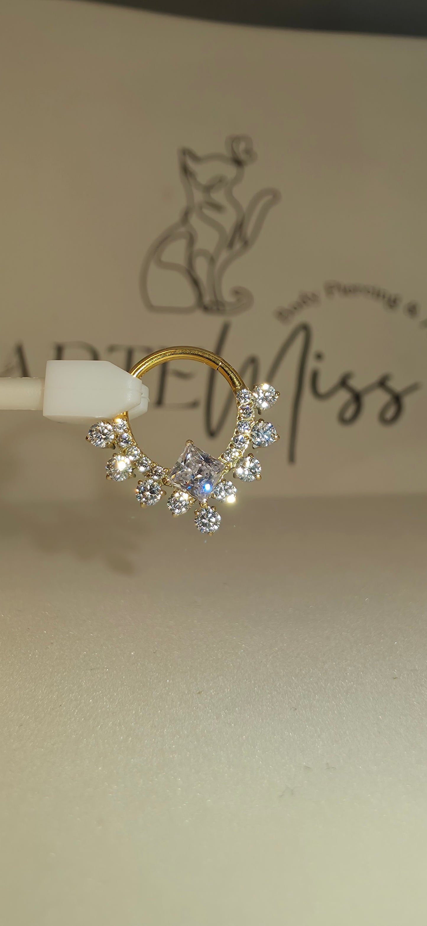 Clicker de Titanio con incrustaciones de zirconia varios colores