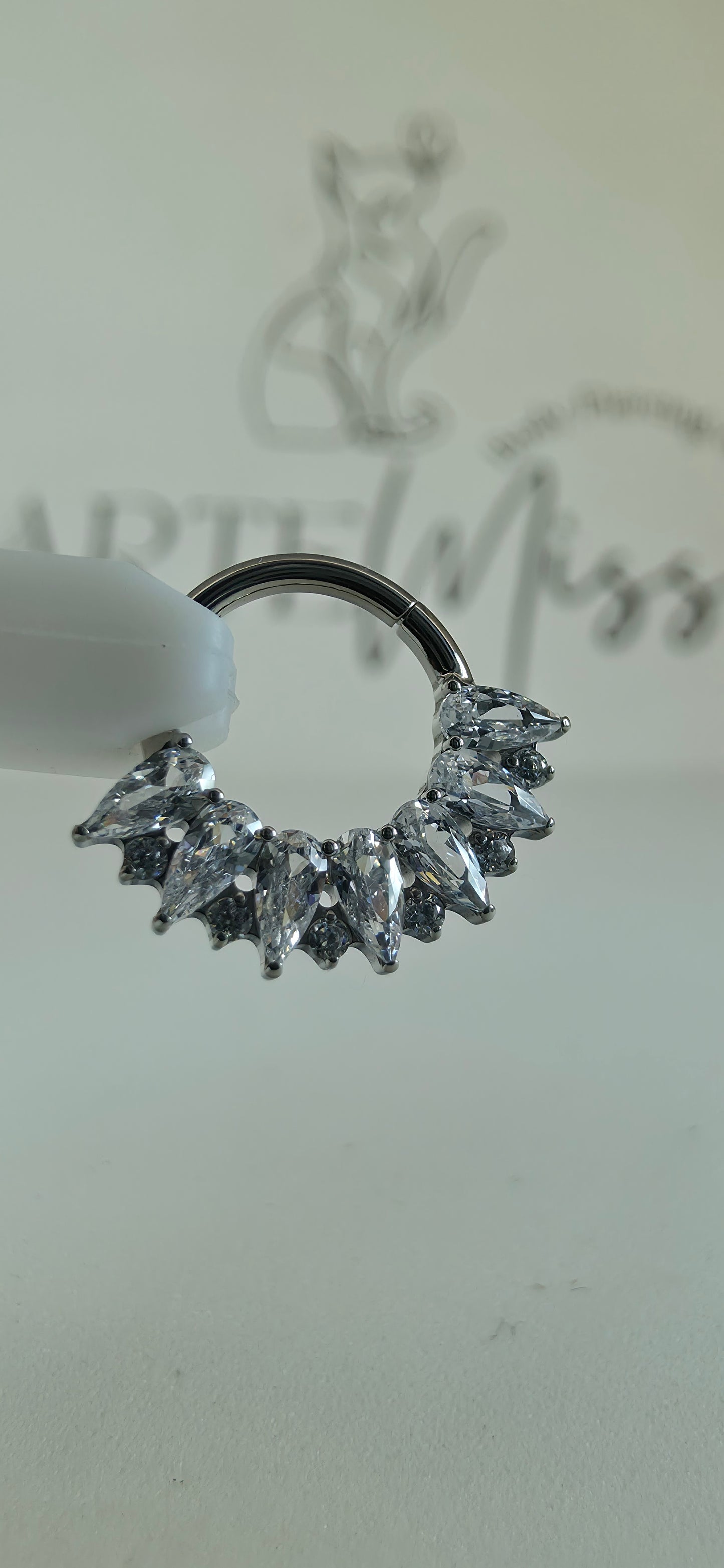 Clicker de Titanio con incrustaciones de zirconia