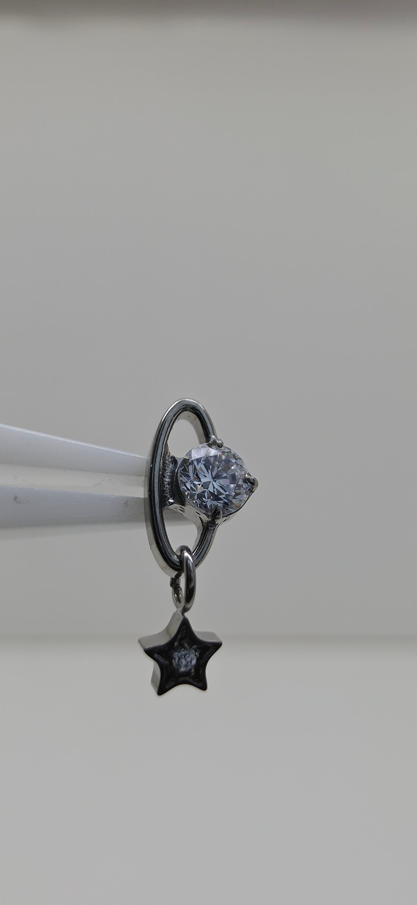 Piercing Titanio planeta