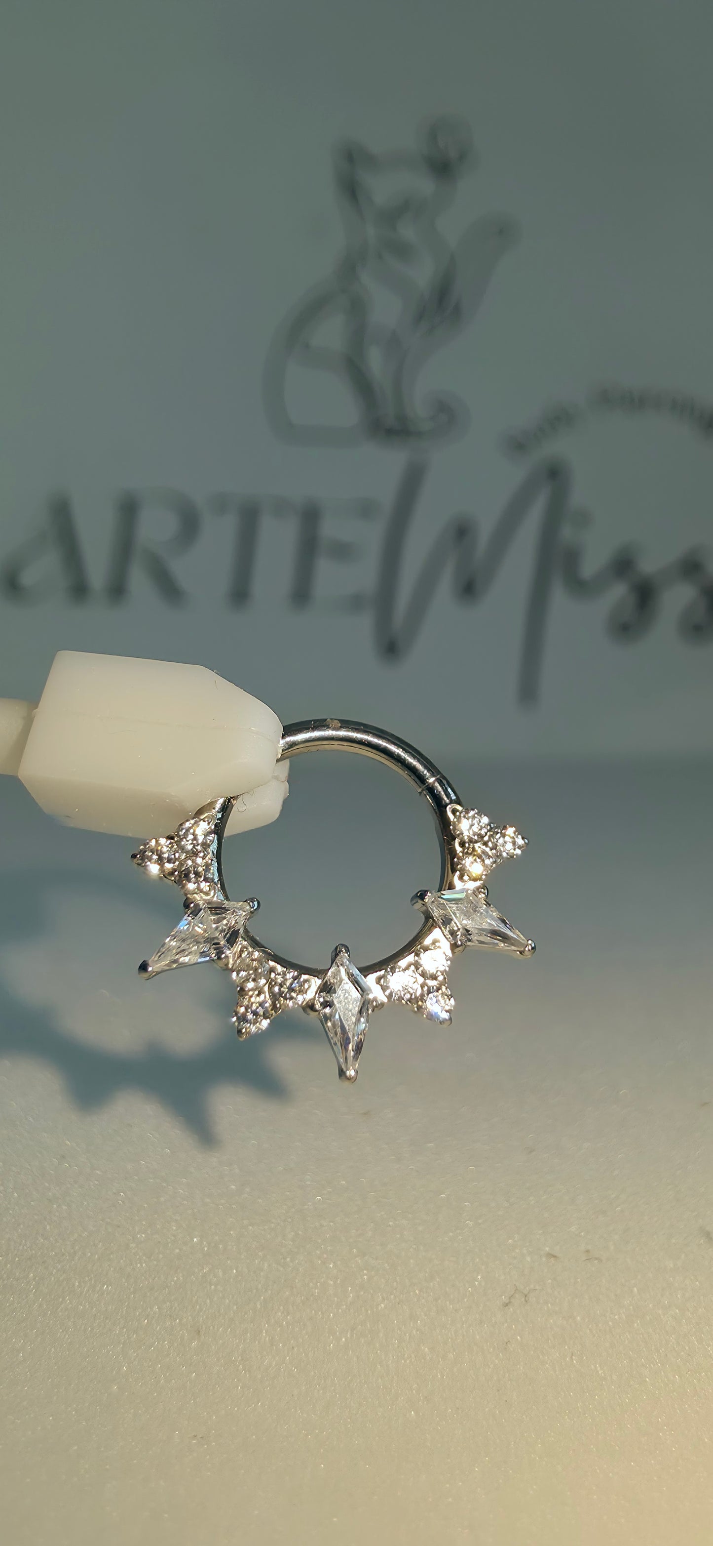 Clicker de Titanio con incrustaciones de zirconia