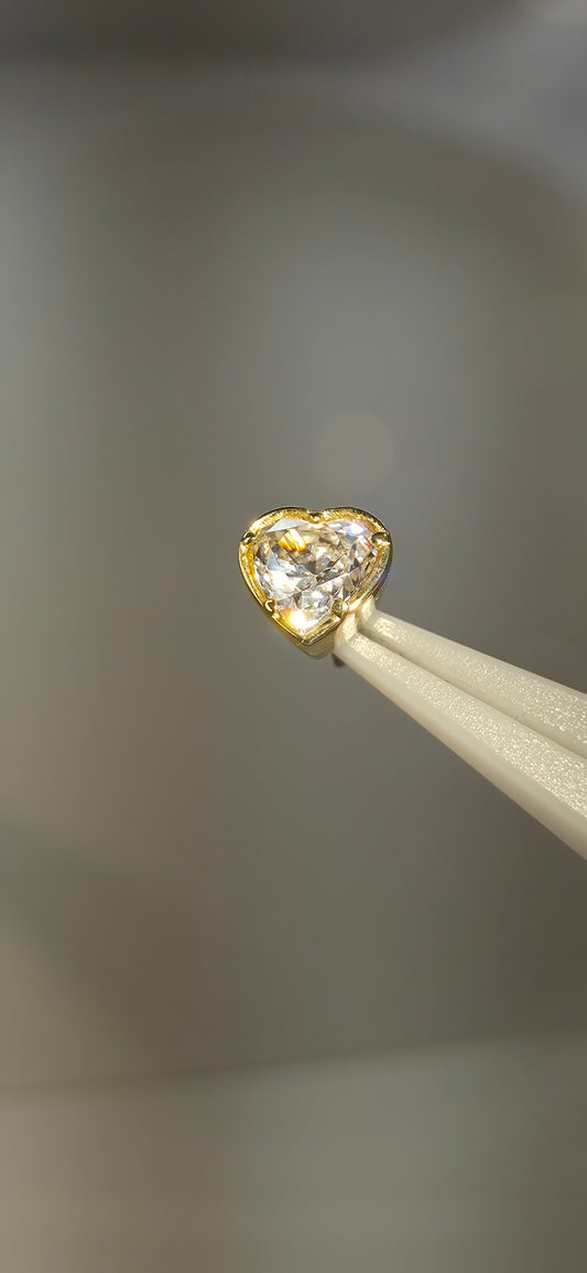 Corazón en oro de 18k con cristal Swarovski