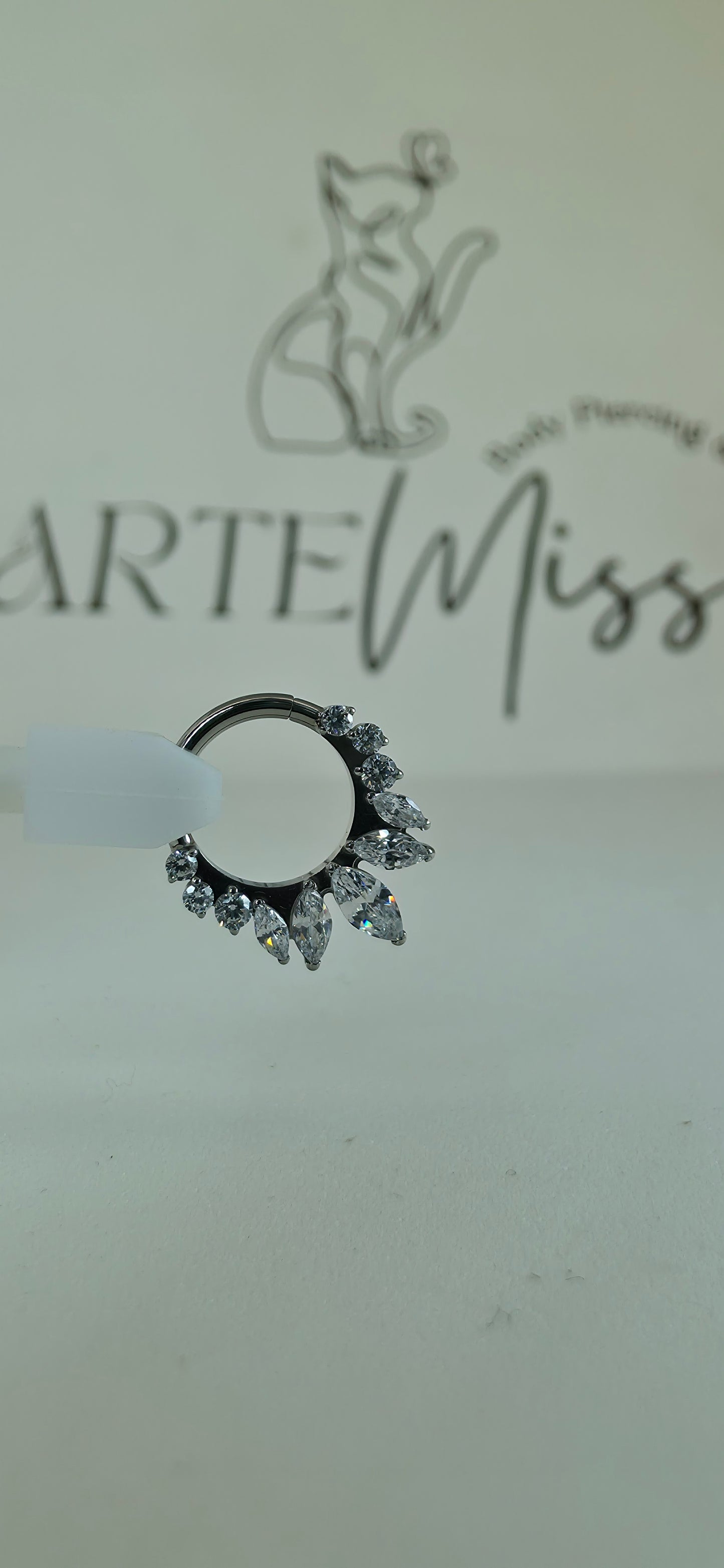 Clicker de Titanio con incrustaciones de zirconia