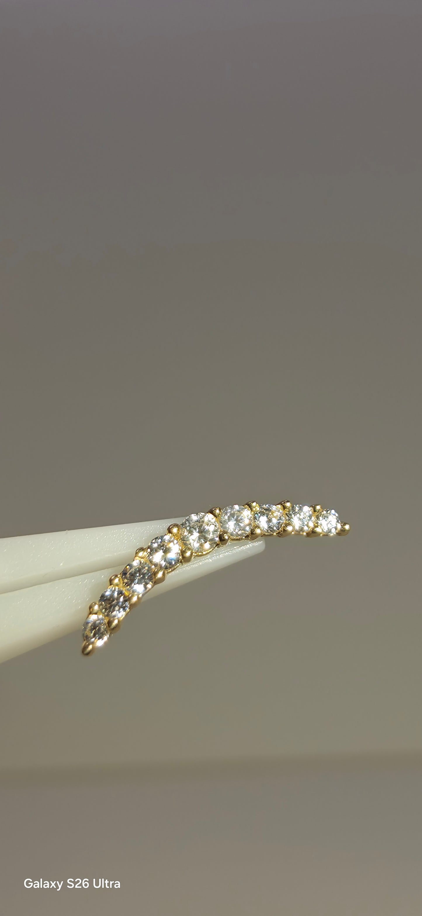 Cluster largo en oro de 18k con criatales Swarovski