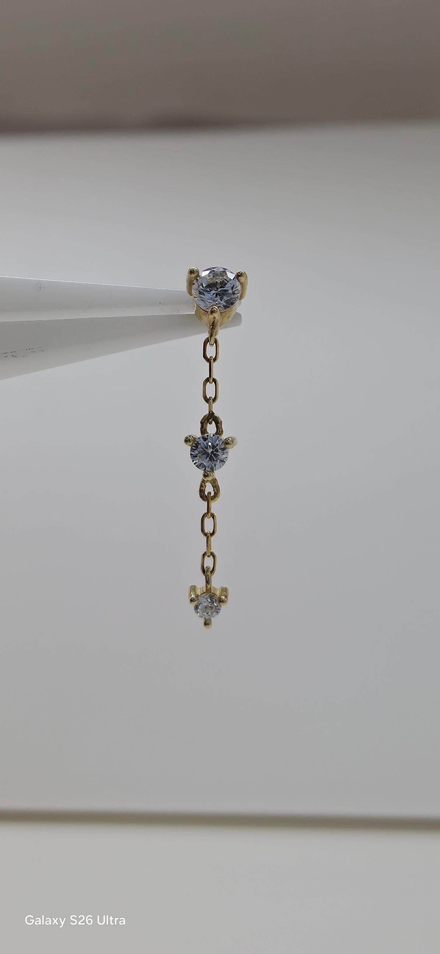 Zirconias colgante triple en oro de 14k