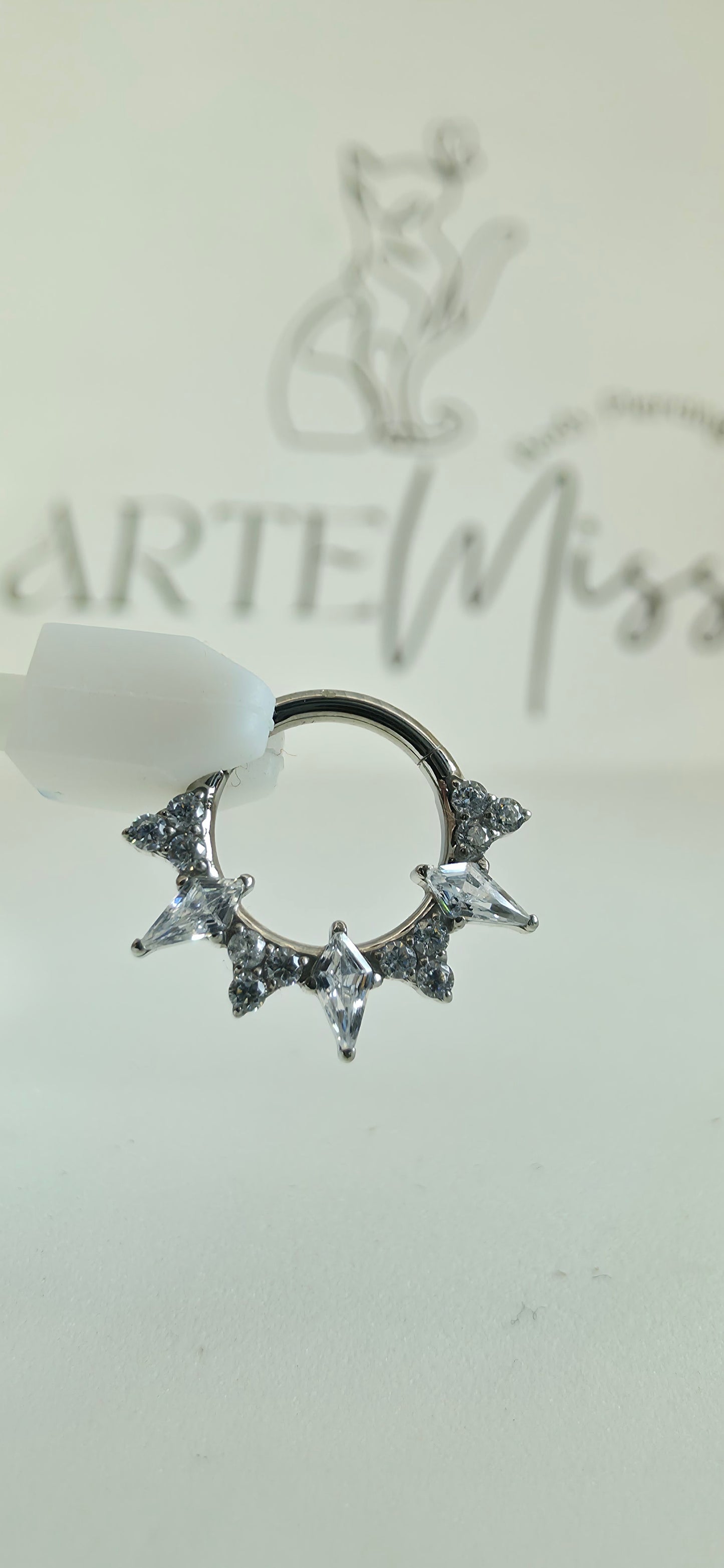 Clicker de Titanio con incrustaciones de zirconia