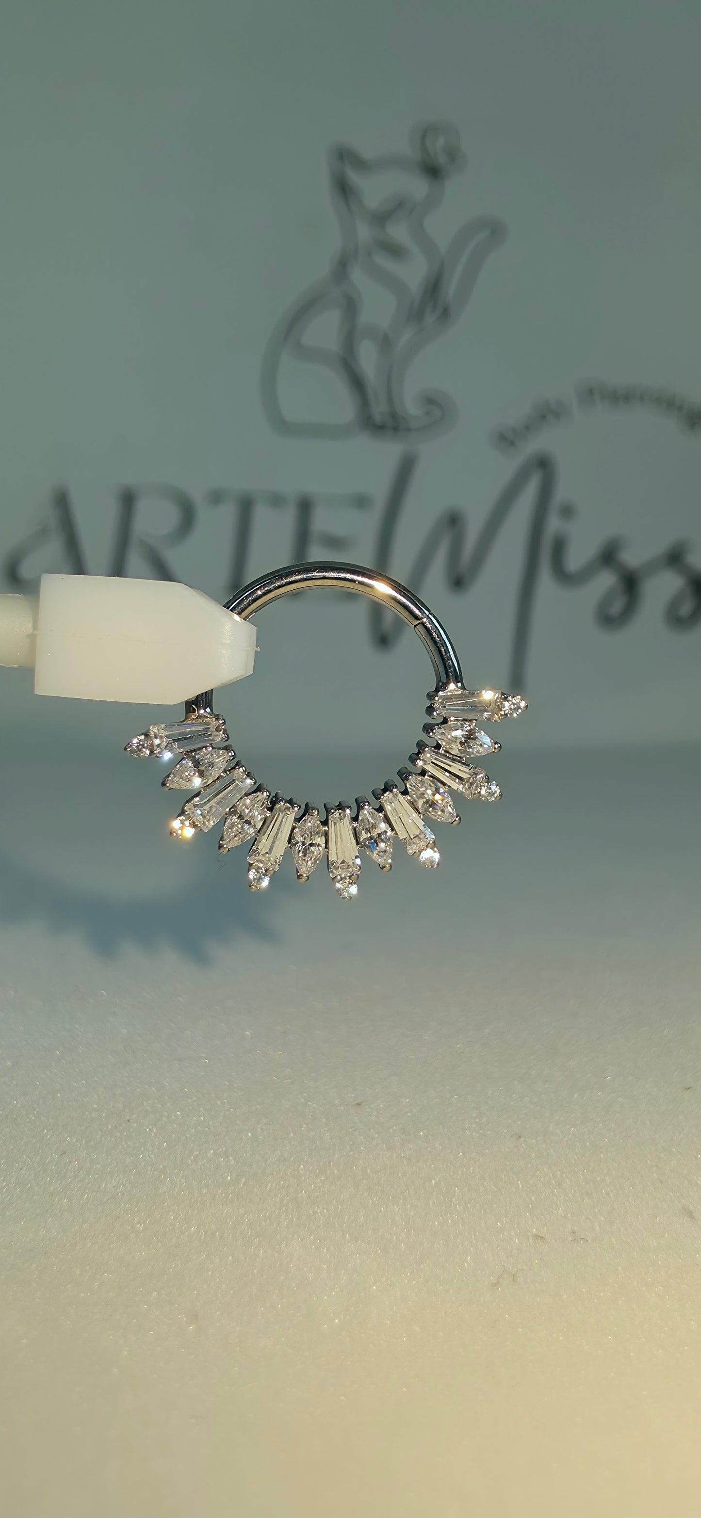 Clicker de Titanio con incrustaciones de zirconia