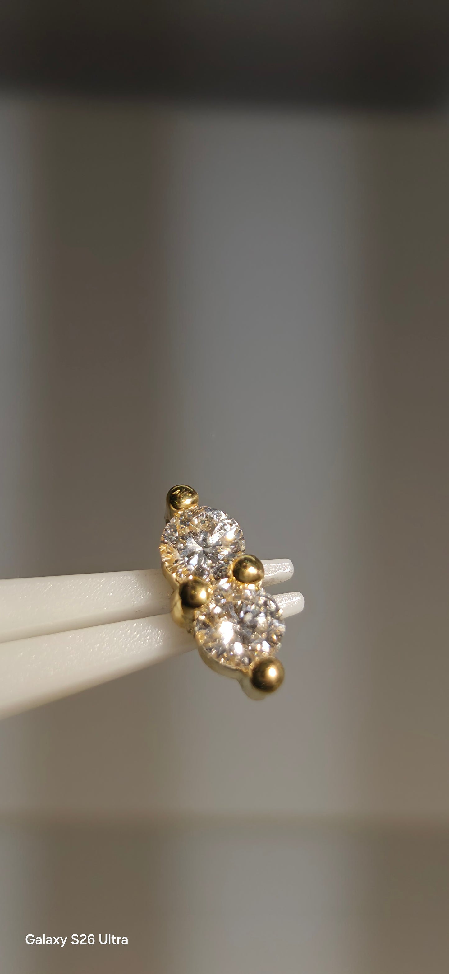 Diamante doble en oro de 18k