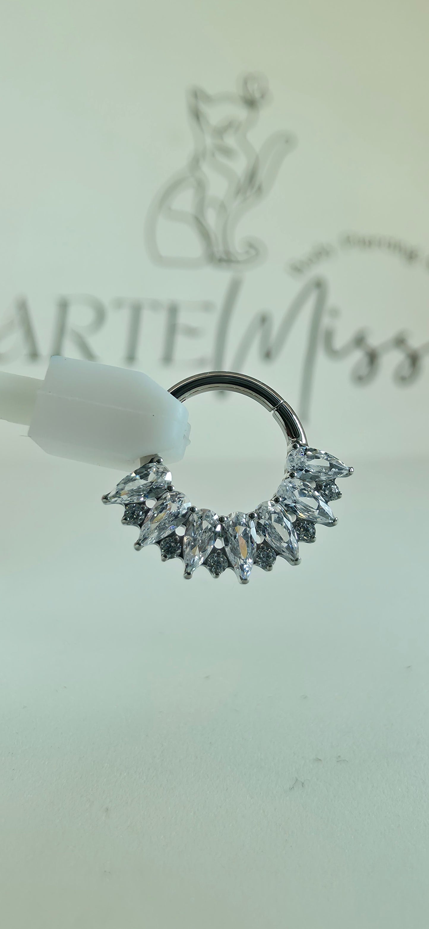 Clicker de Titanio con incrustaciones de zirconia