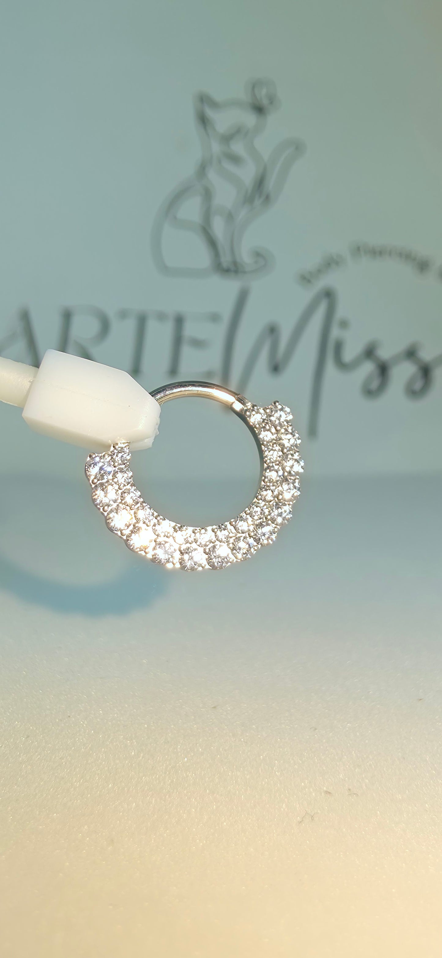 Clicker de Titanio  con incrustaciones de zirconia
