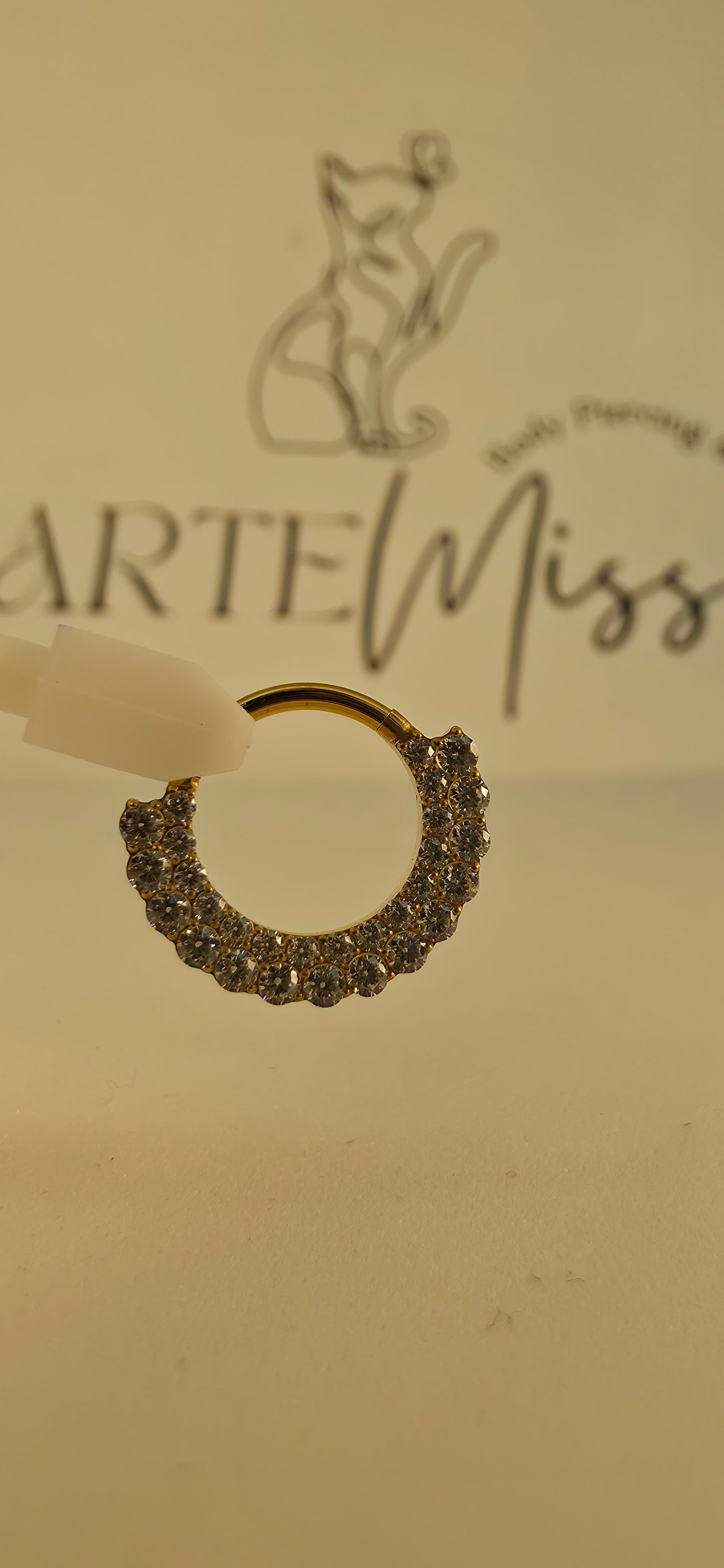 Clicker de Titanio  con incrustaciones de zirconia