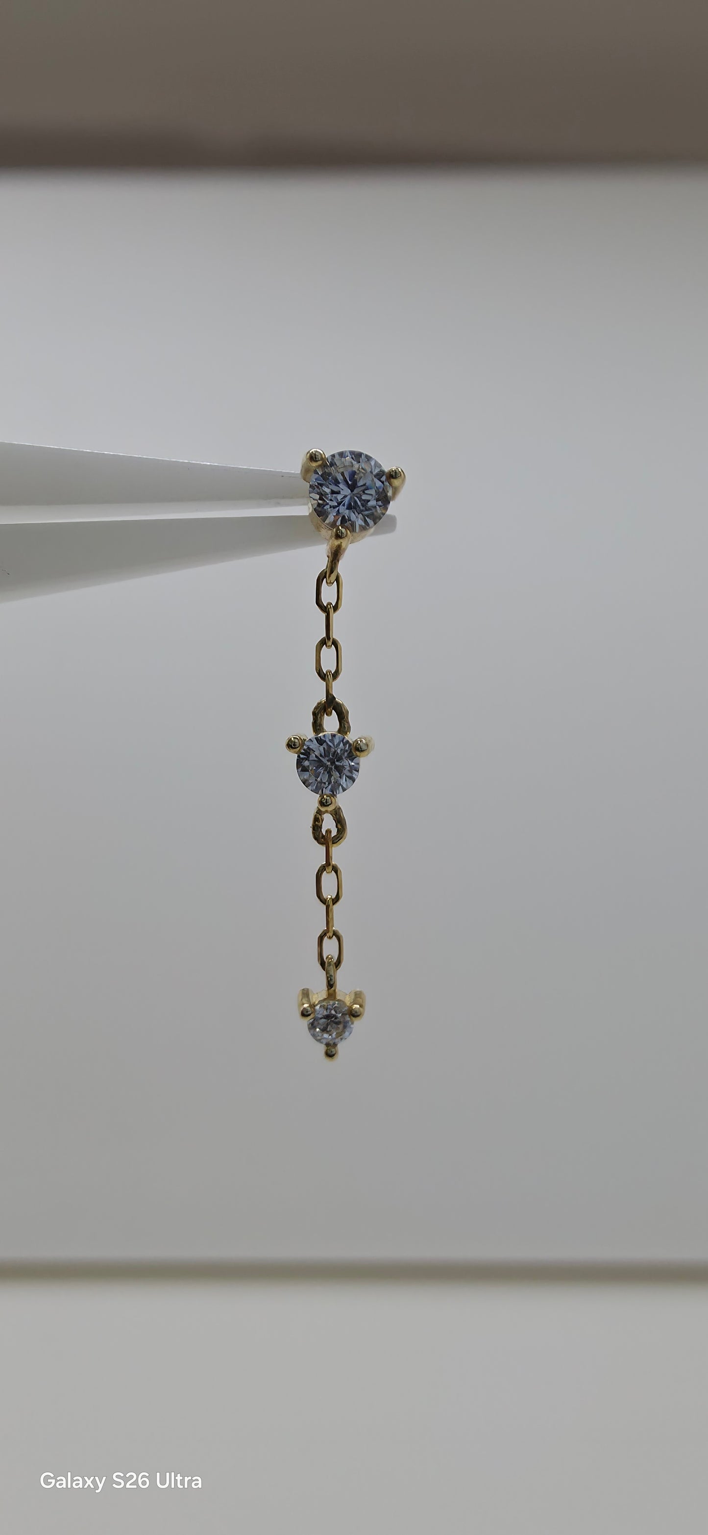 Zirconias colgante triple en oro de 14k