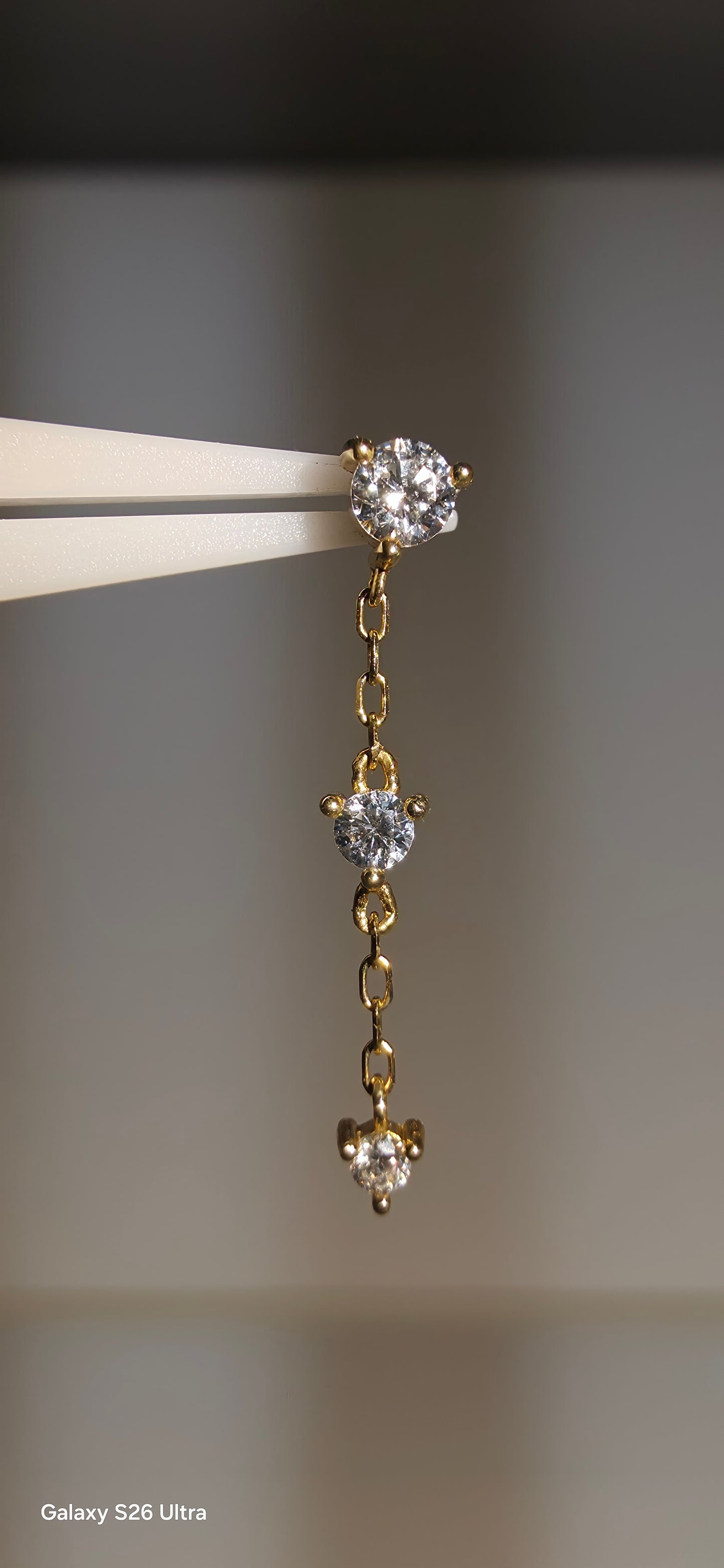 Zirconias colgante triple en oro de 14k