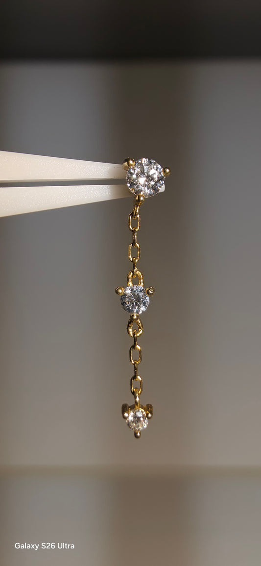 Zirconias colgante triple en oro de 14k