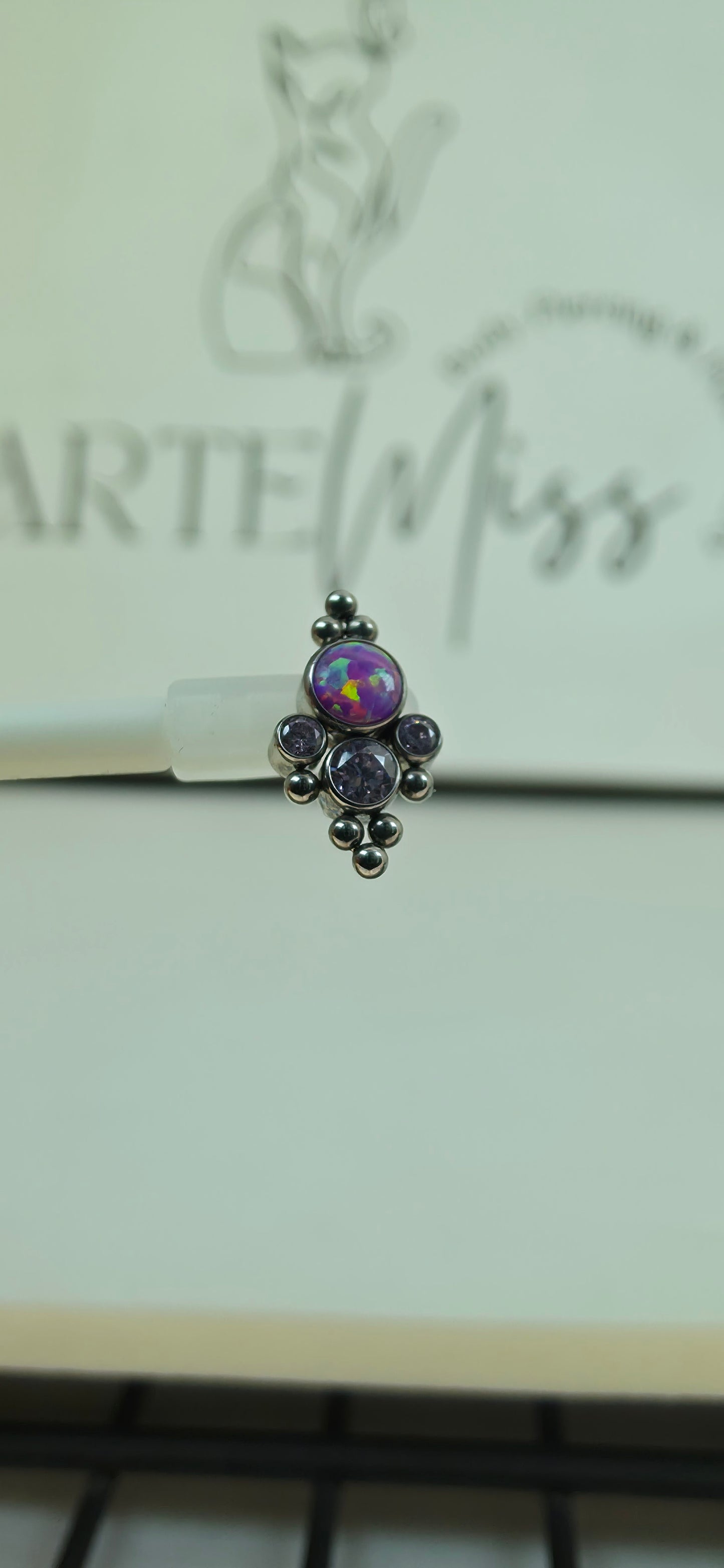 Top de Titanio con opalo y zirconias