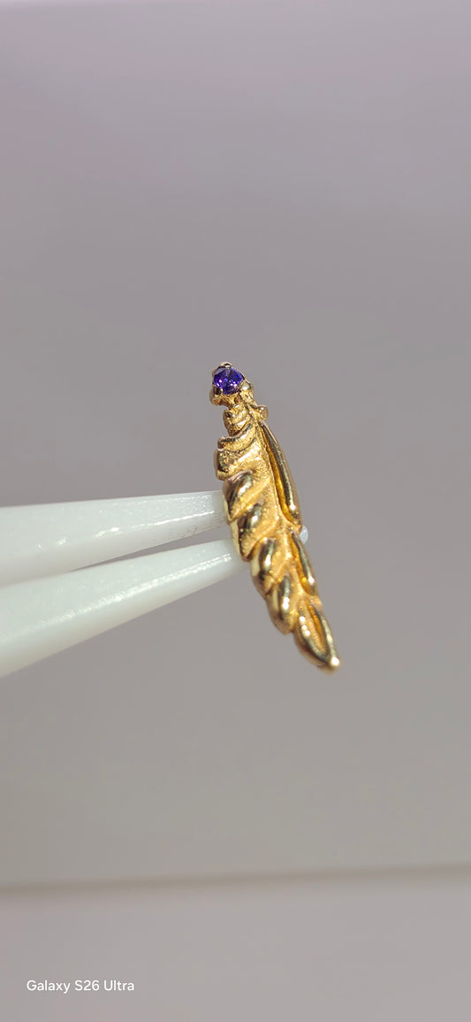 Pluma en oro de 14k con cistal Swarovski blanco o morado