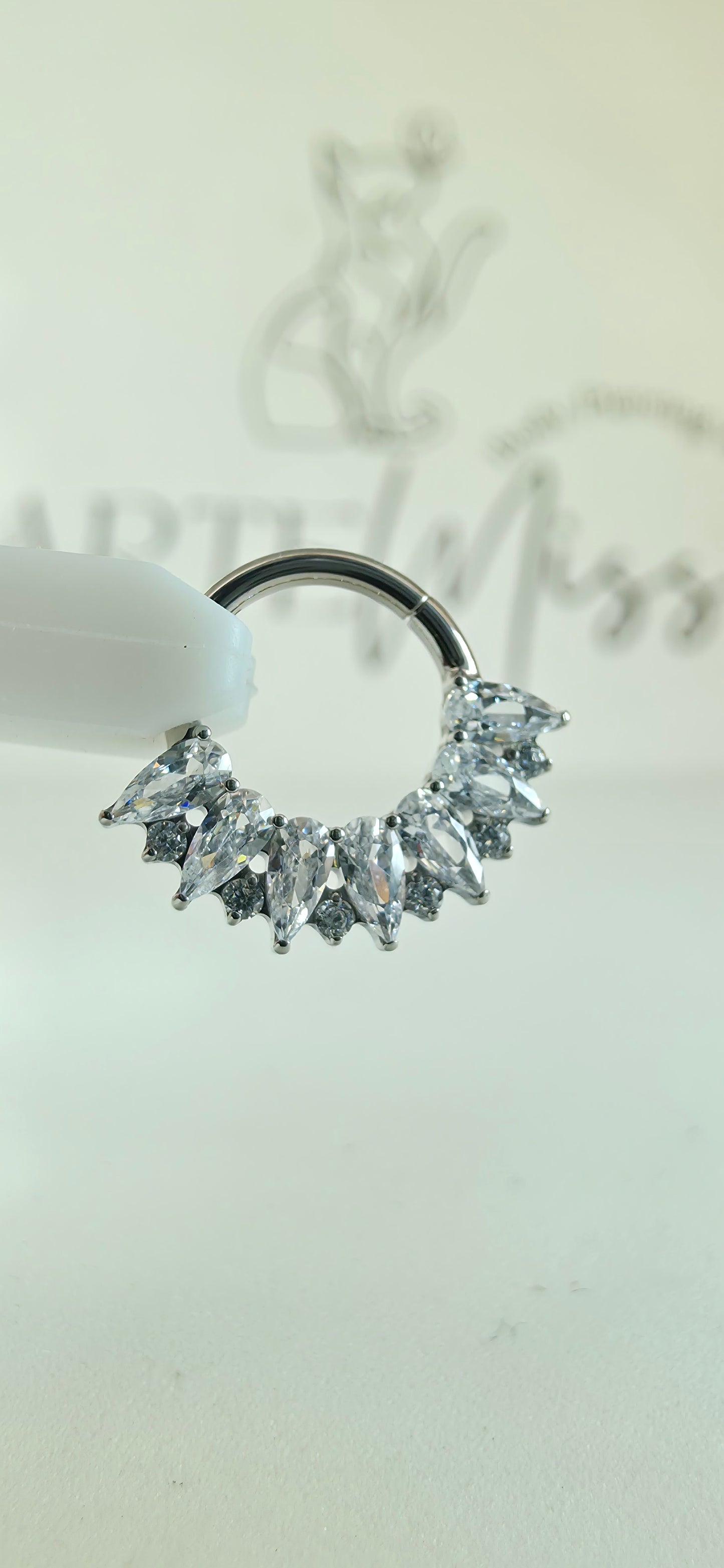 Clicker de Titanio con incrustaciones de zirconia