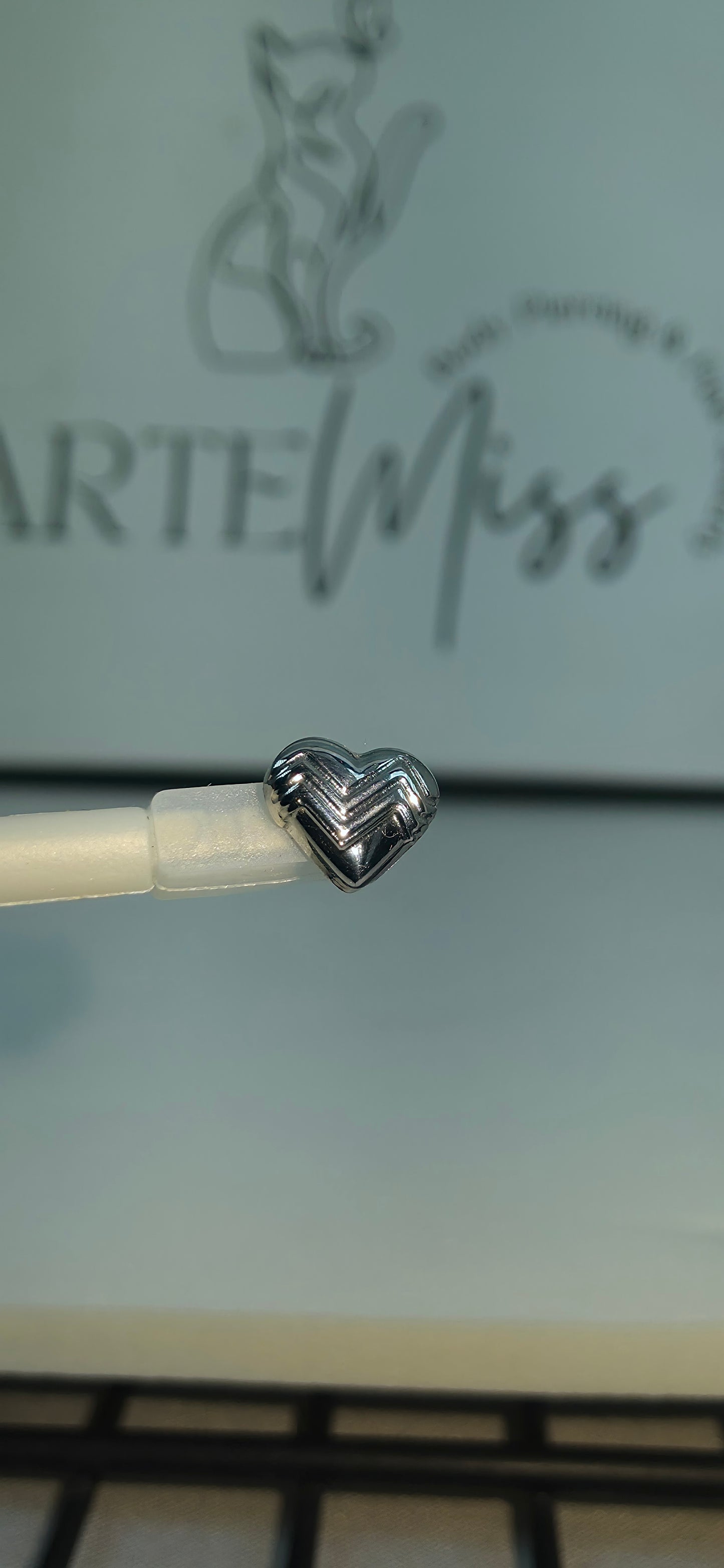 Top de Titanio en forma de corazon