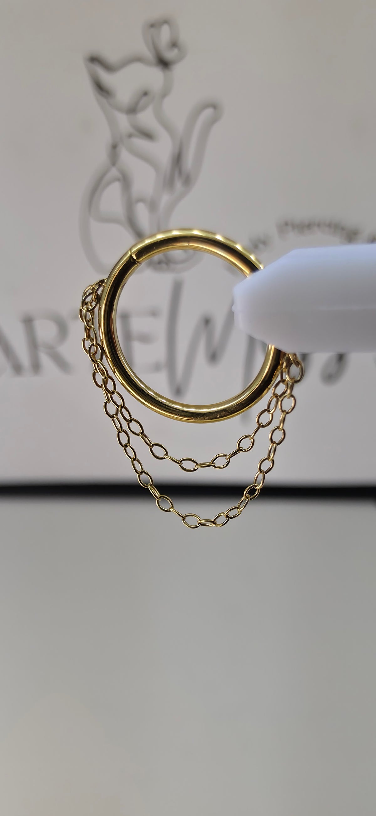 Clicker, argolla con cadena