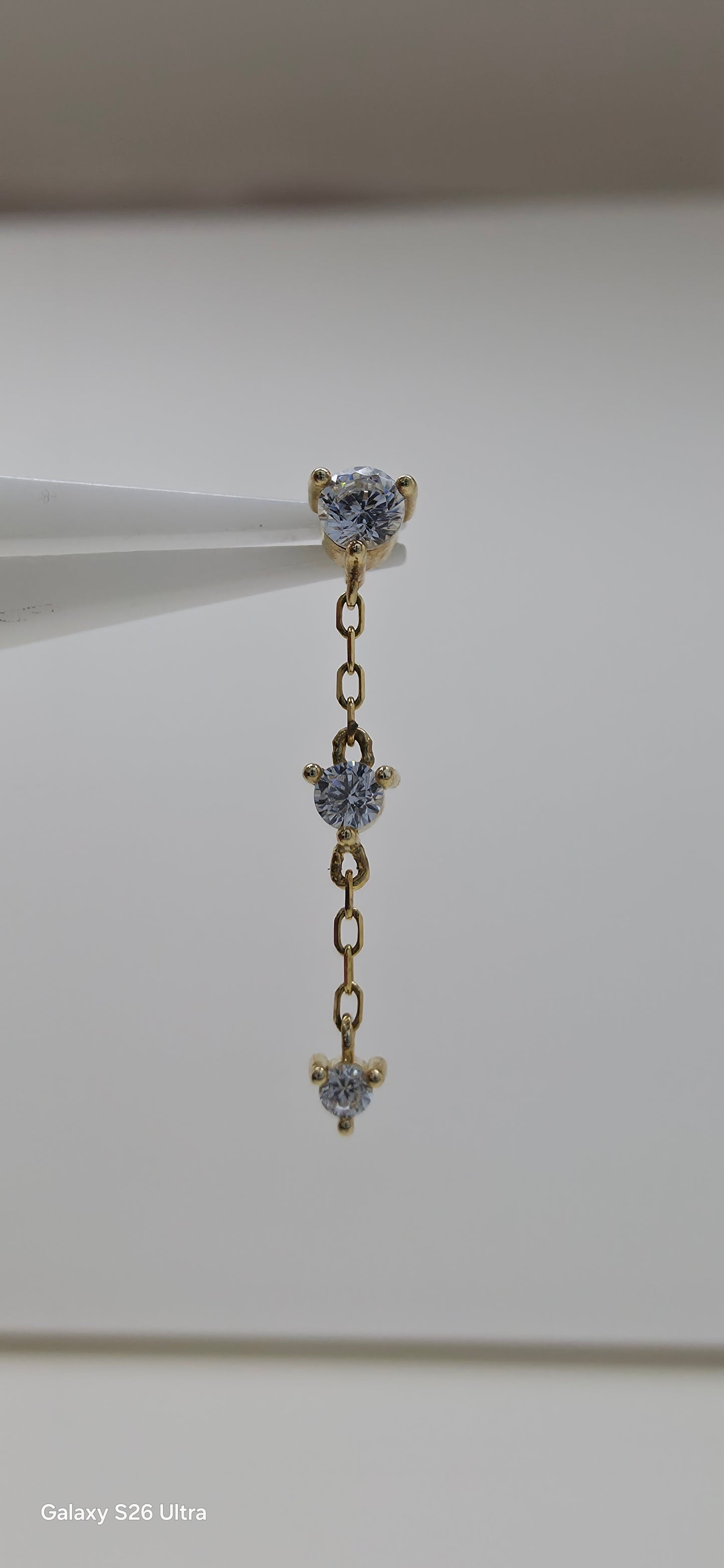 Zirconias colgante triple en oro de 14k