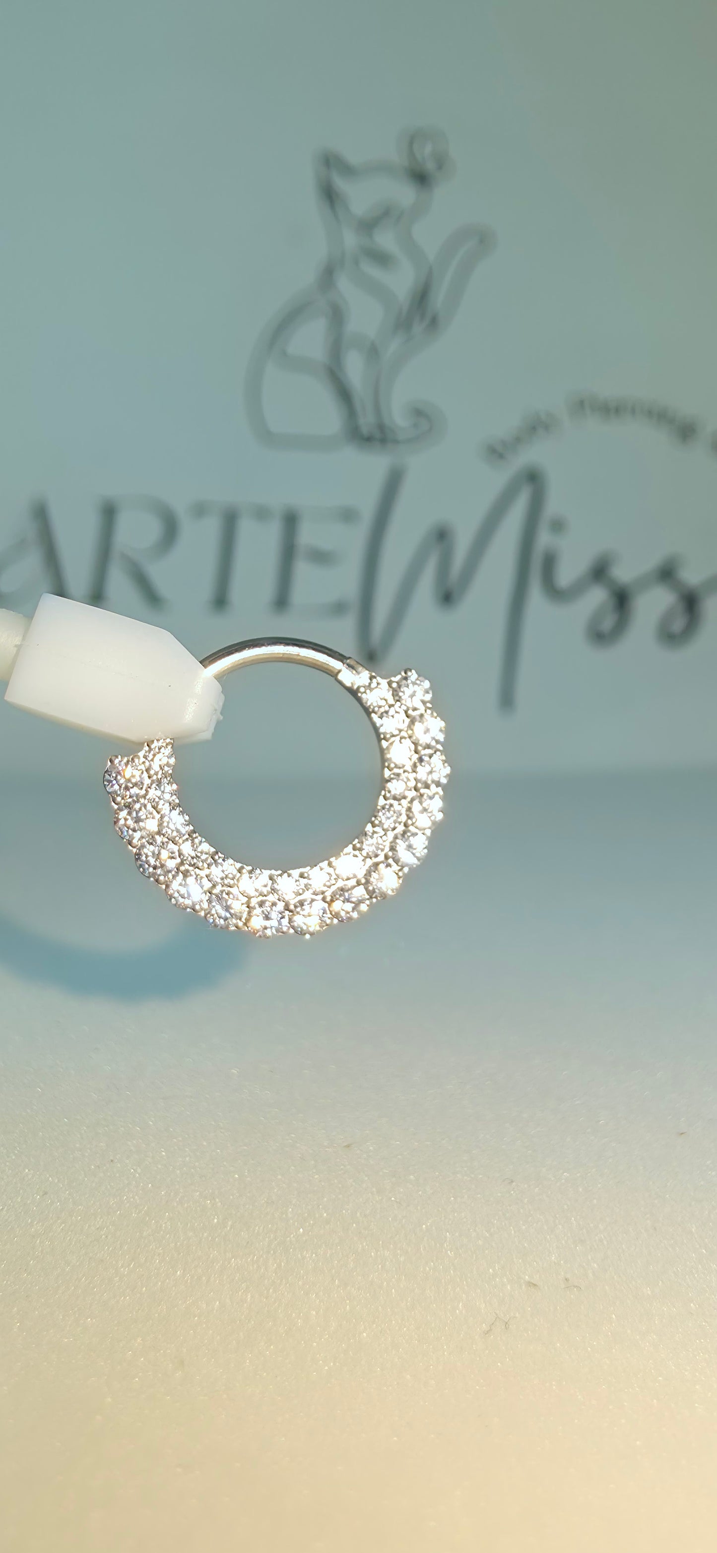 Clicker de Titanio  con incrustaciones de zirconia