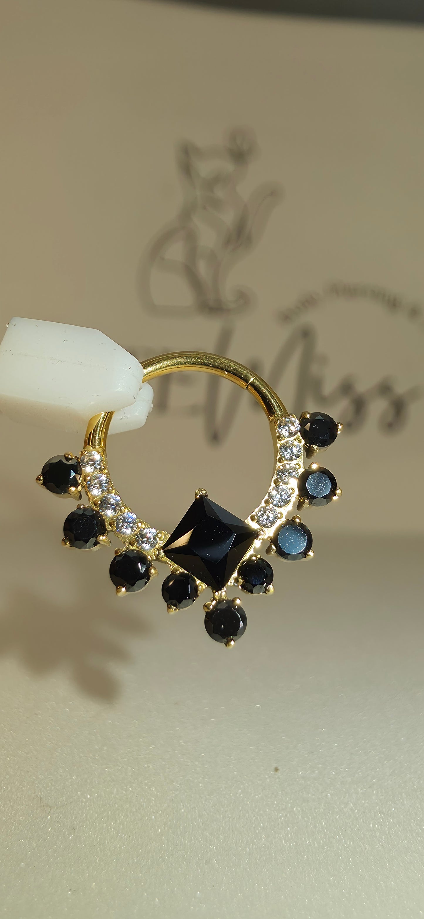 Clicker de Titanio con incrustaciones de zirconia varios colores