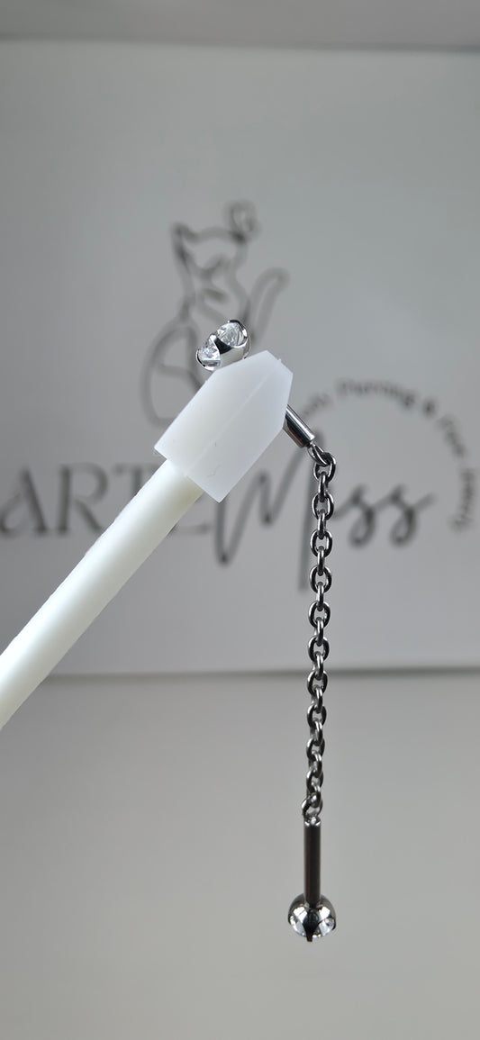 Pieza Industrial con cadena y zirconias en Titanio