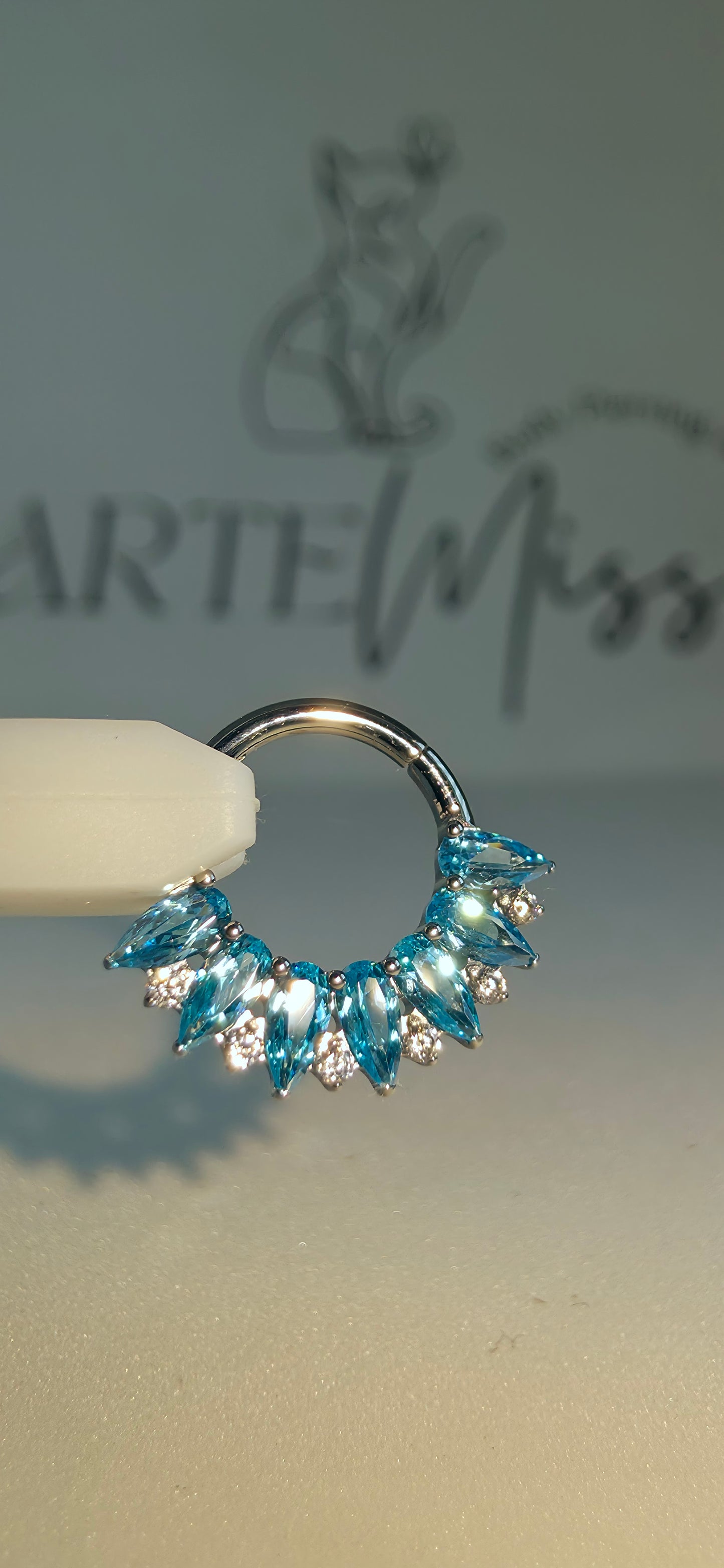 Clicker de Titanio con incrustaciones de zirconia