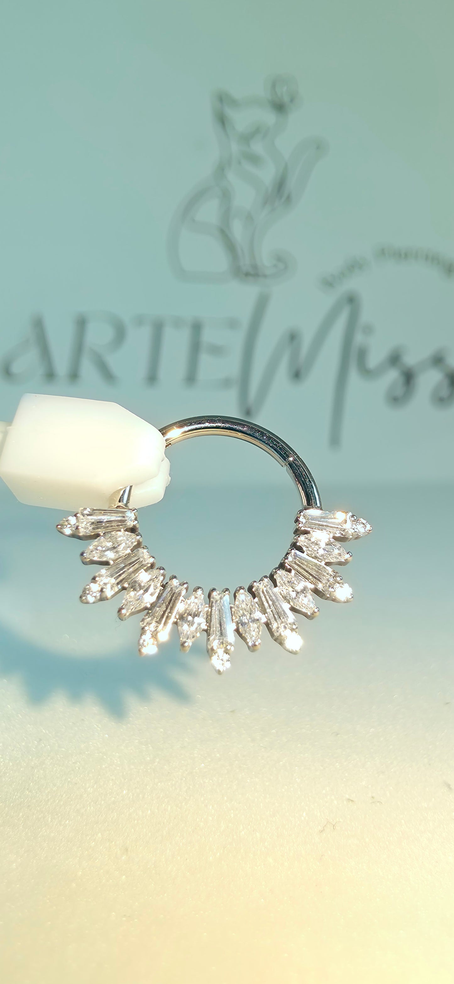 Clicker de Titanio con incrustaciones de zirconia