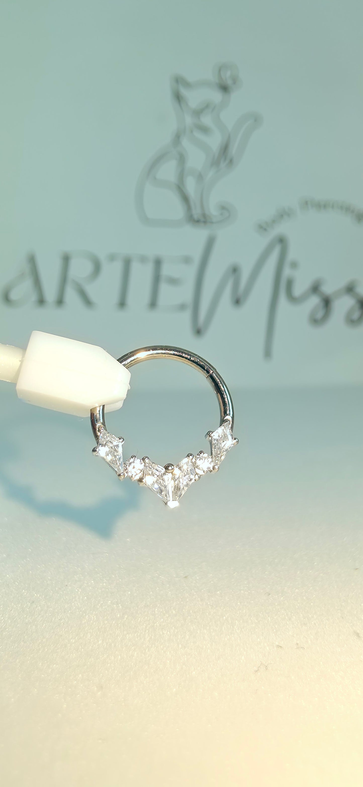 Clicker de Titanio con incrustaciones de zirconia
