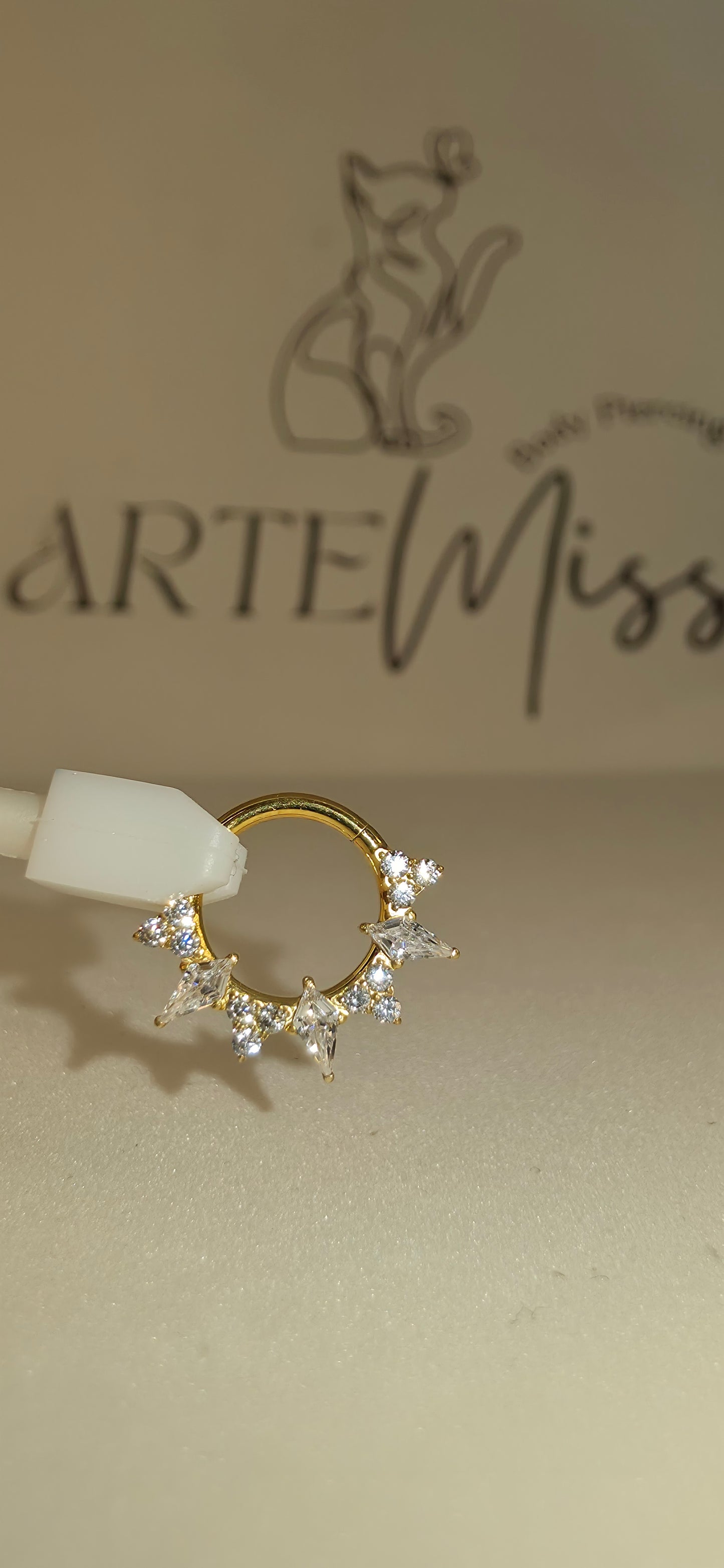 Clicker de Titanio con incrustaciones de zirconia