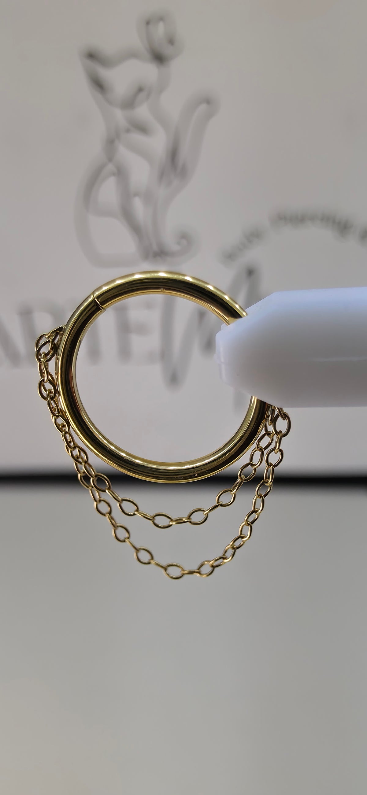 Clicker, argolla con cadena