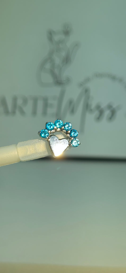 Top de Titanio en forma de corazon con incrustaciones de zirconia
