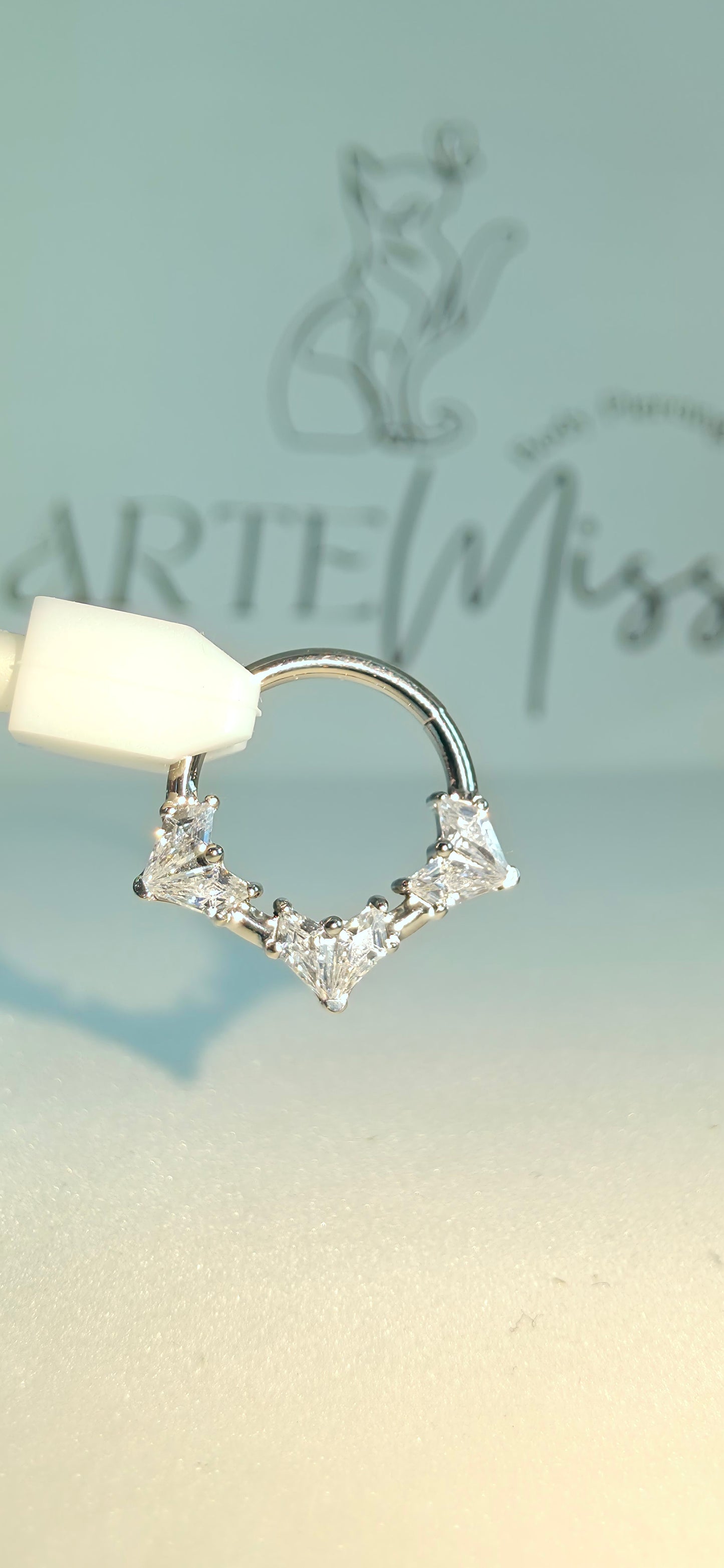 Clicker de Titanio con incrustaciones de zirconia