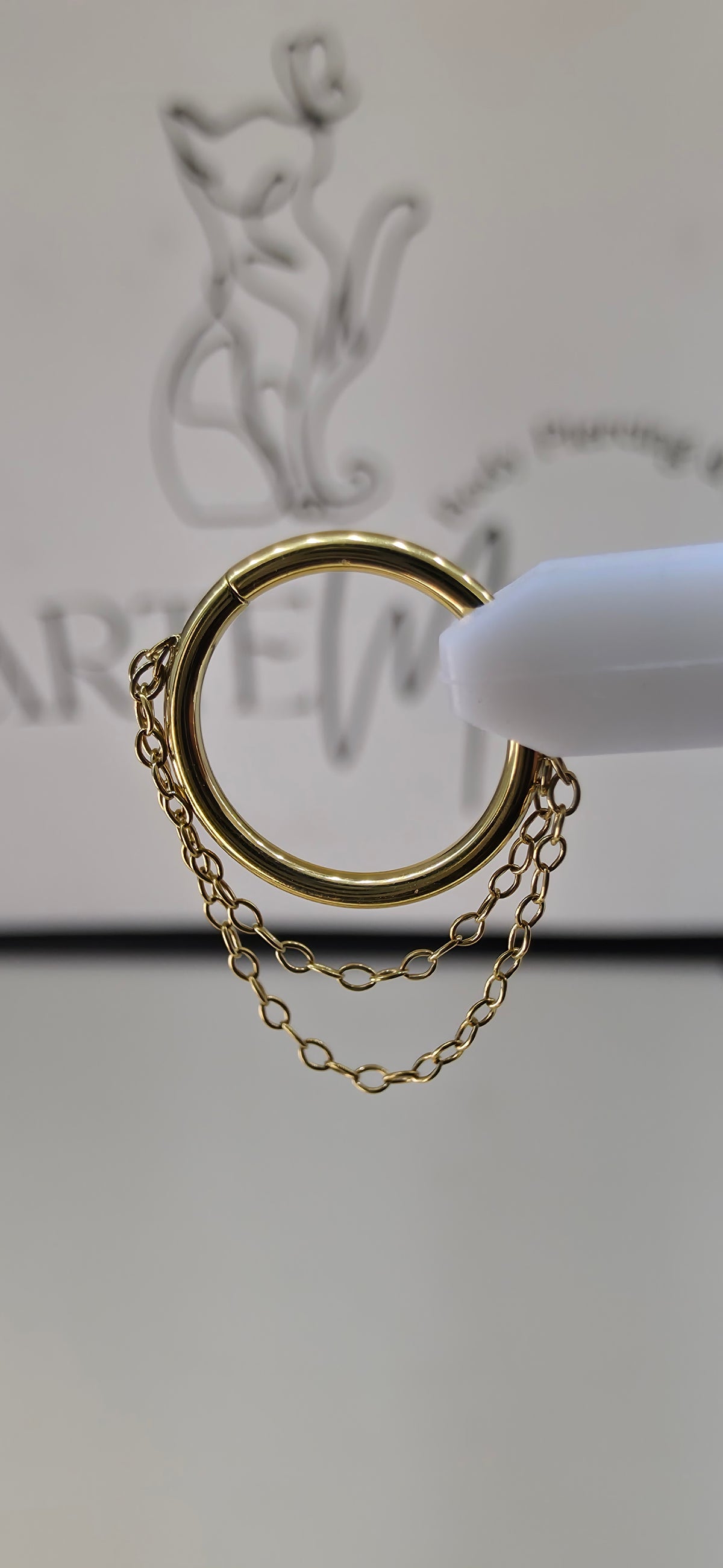 Clicker, argolla con cadena