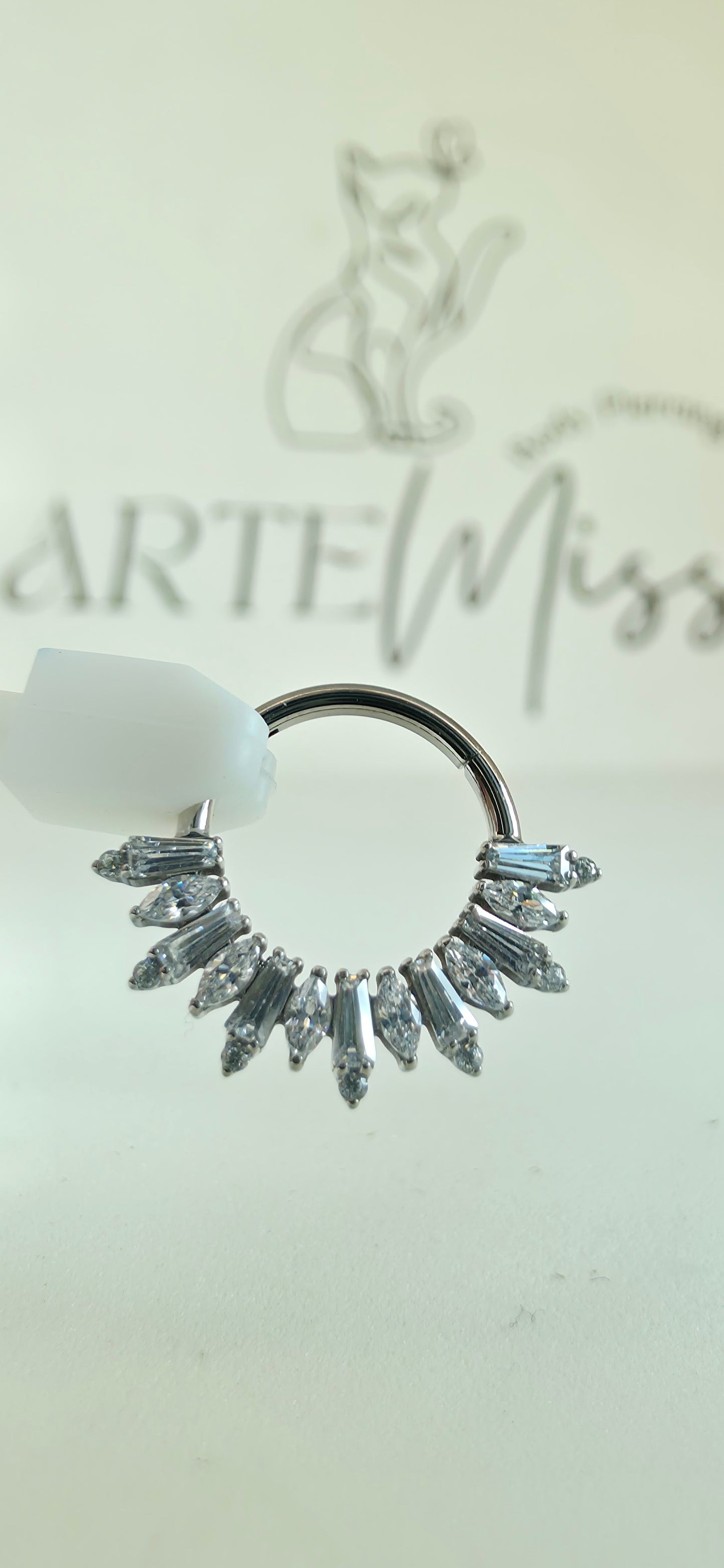 Clicker de Titanio con incrustaciones de zirconia