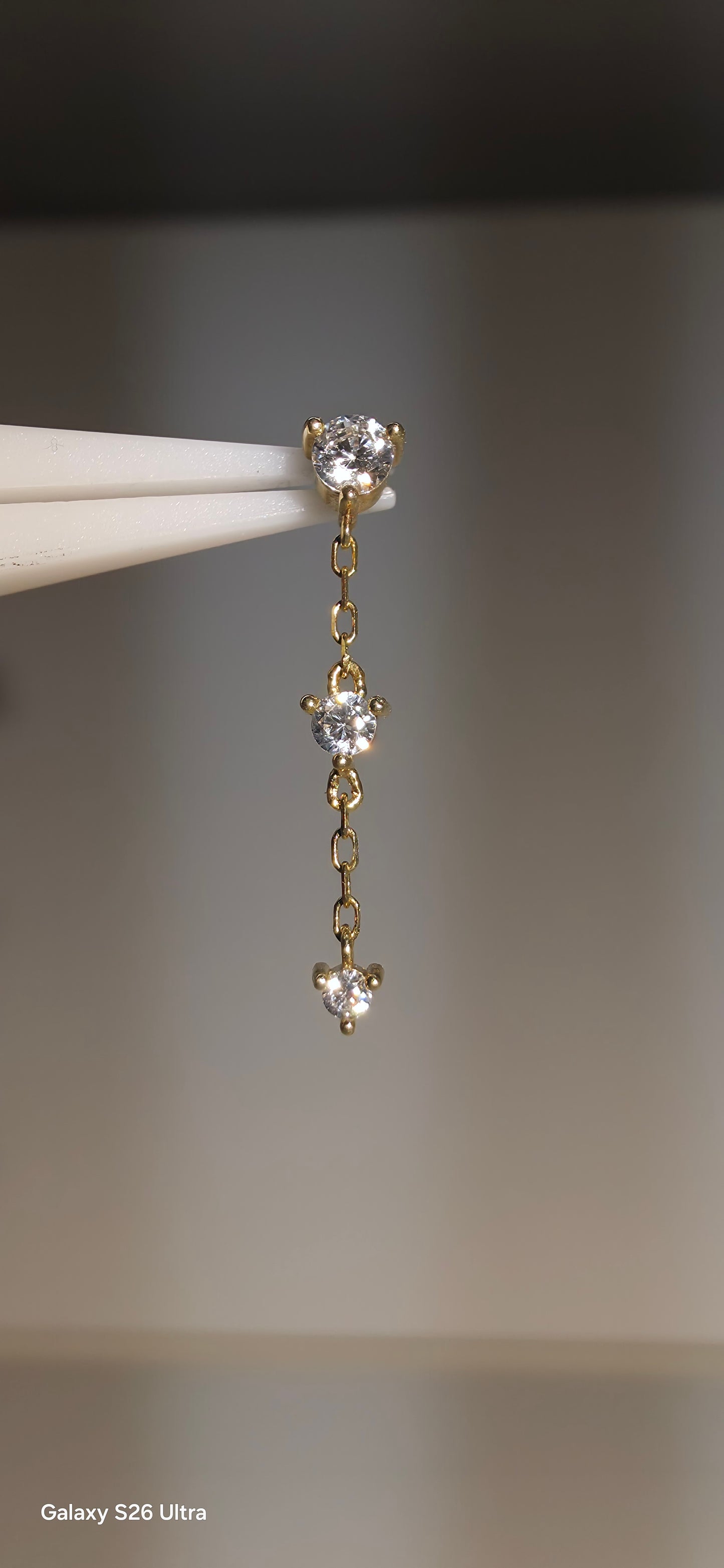 Zirconias colgante triple en oro de 14k