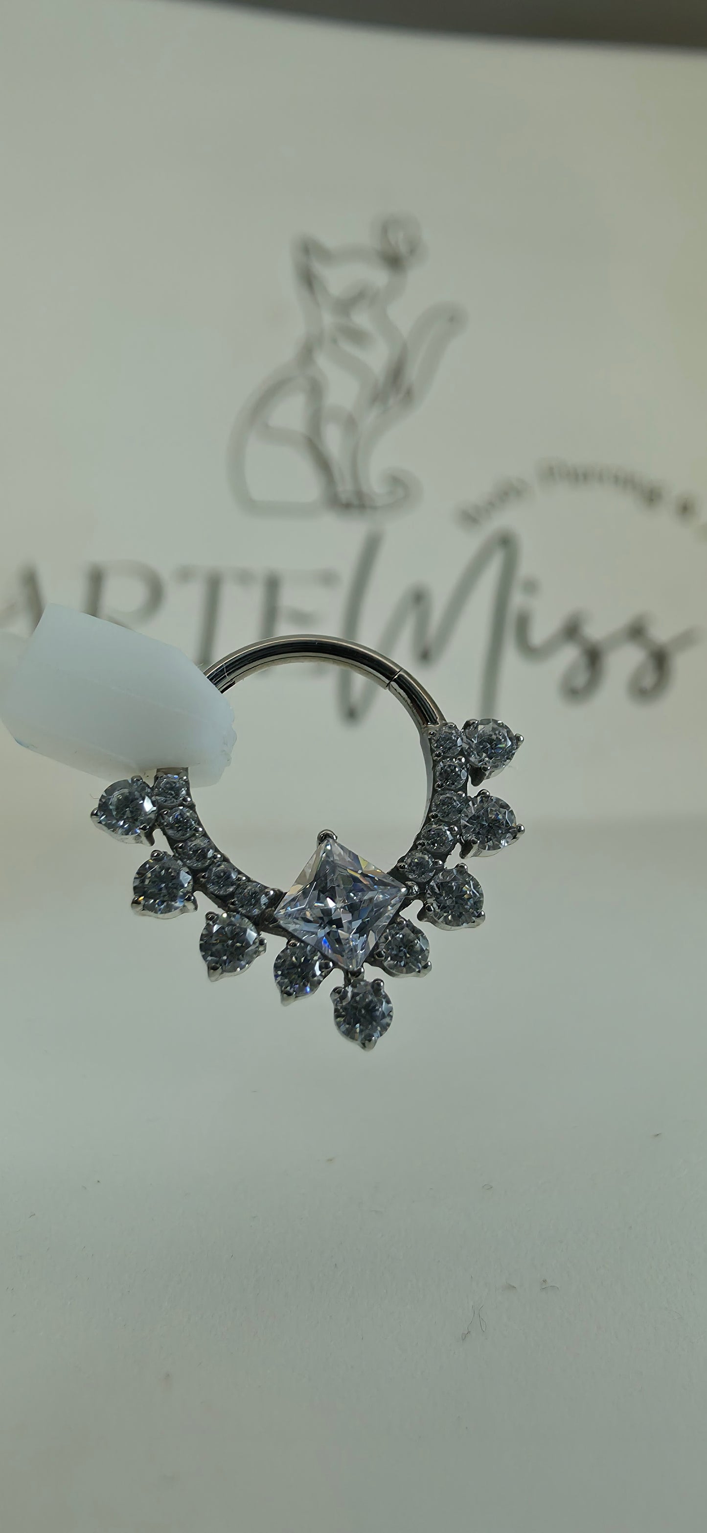 Clicker de Titanio con incrustaciones de zirconia varios colores