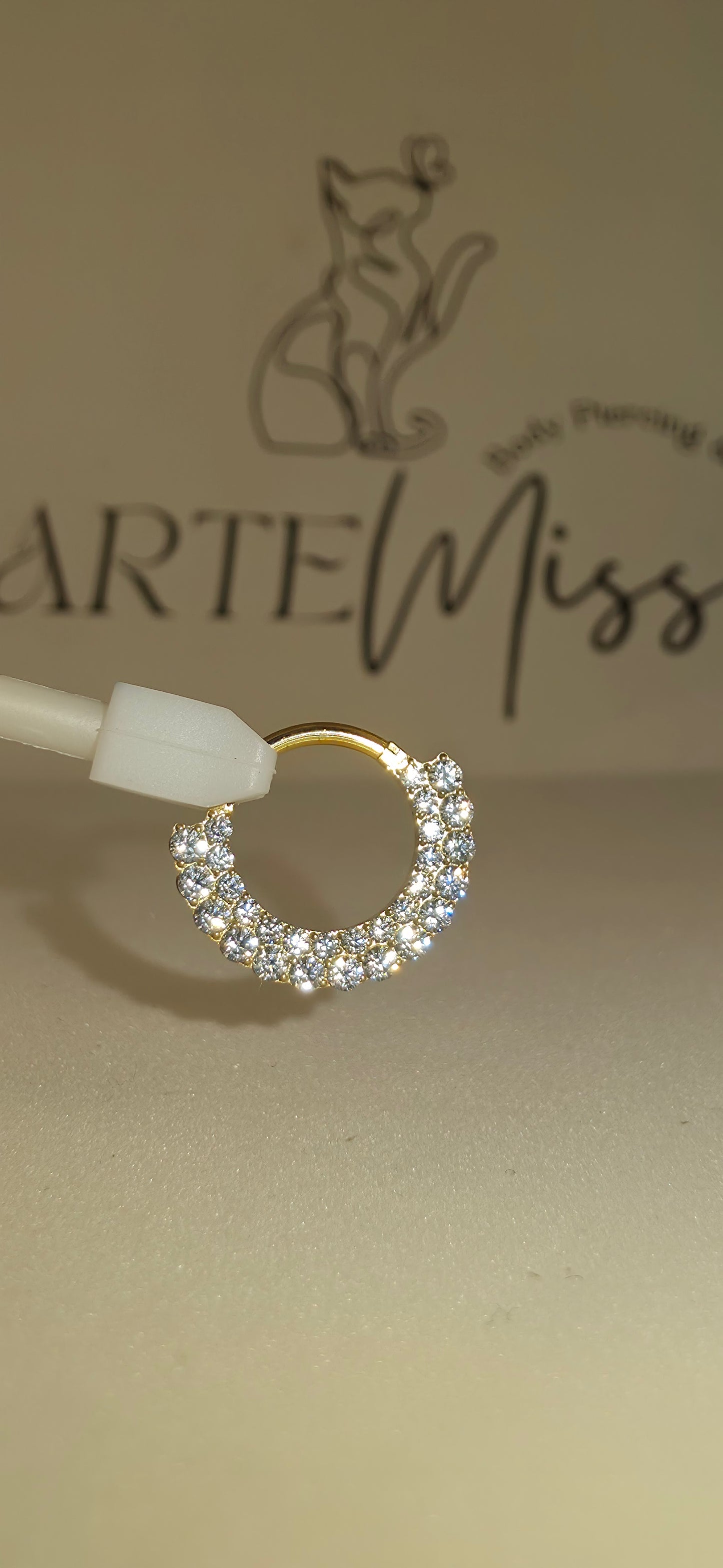 Clicker de Titanio  con incrustaciones de zirconia