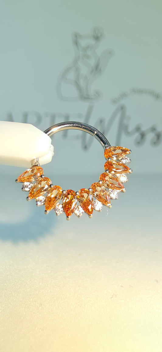 Clicker de Titanio con incrustaciones de zirconia champagne