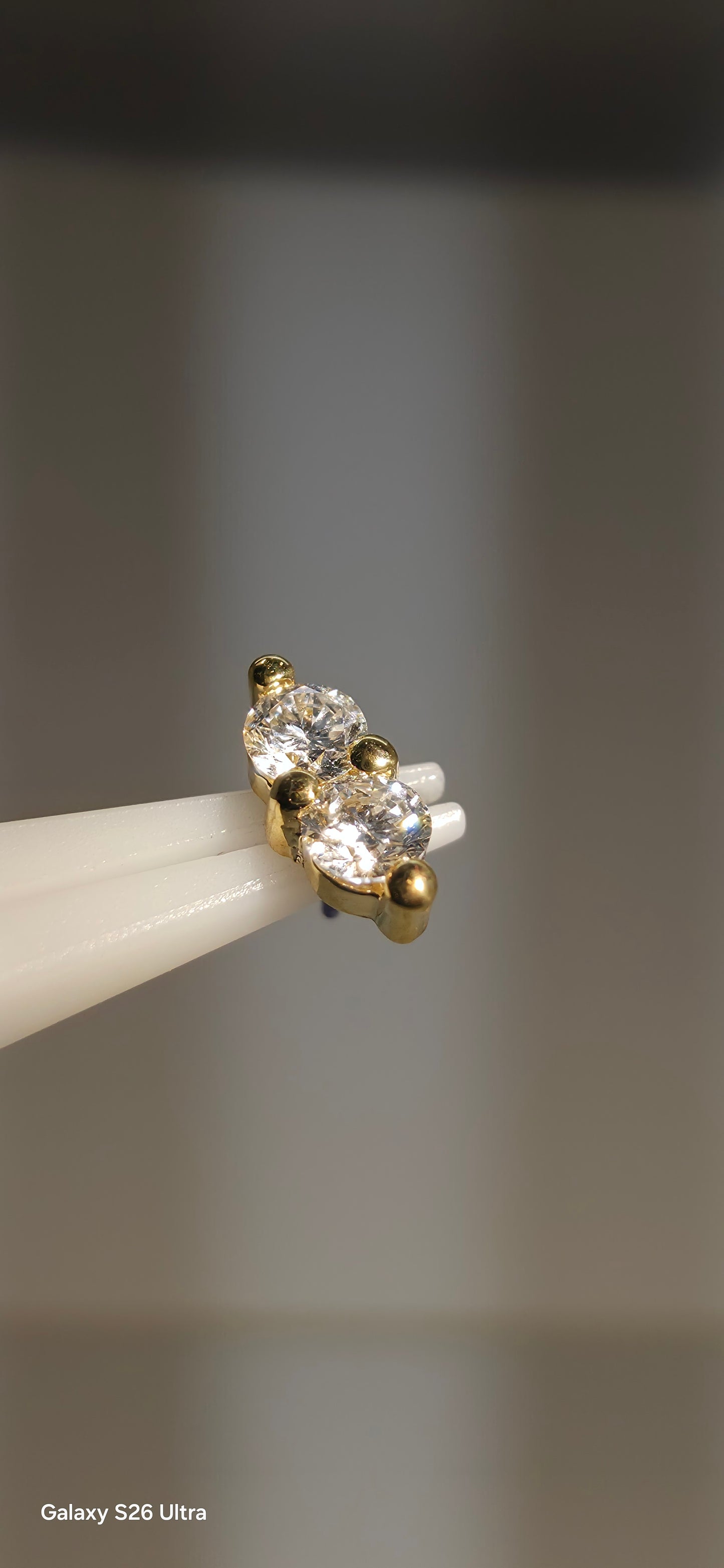 Diamante doble en oro de 18k